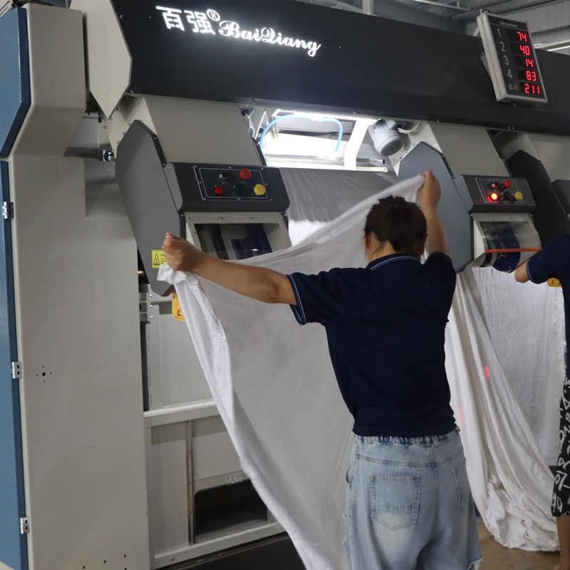 布草洗滌公司燙平機(jī)輸送前端有必要用展布機(jī)嗎？